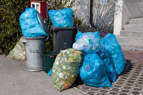Waste collection trucks operating in Sutton